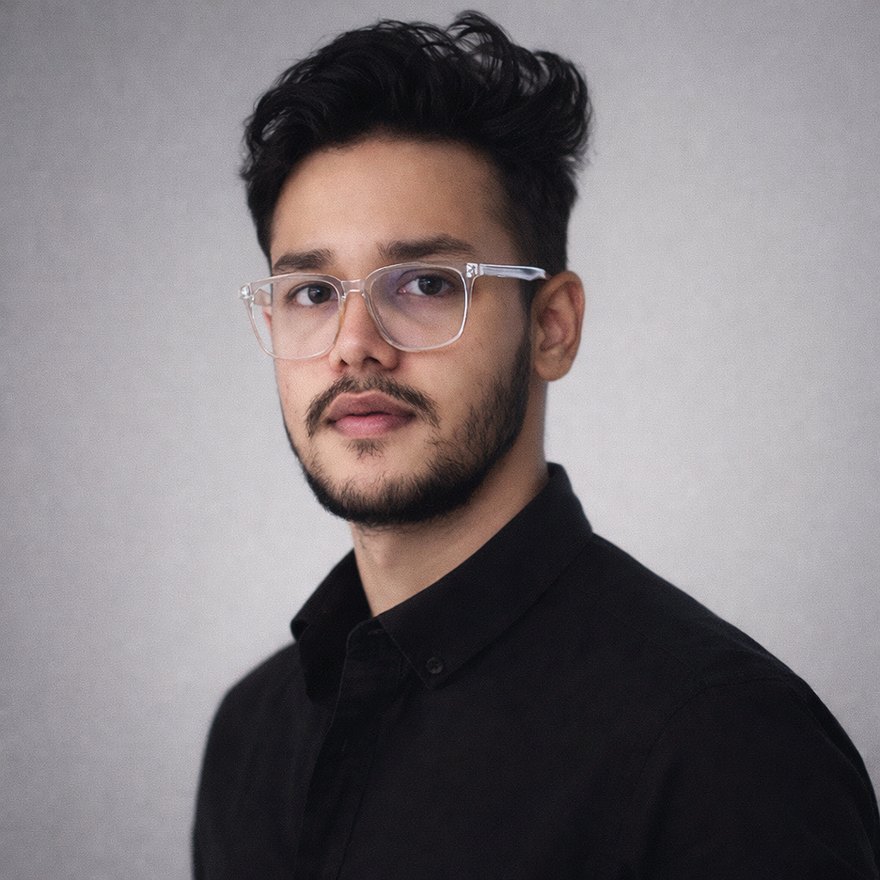 MD Minhazur Rahman — portrait in a black shirt against a grey studio background
